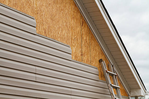 Professional Siding Replacement technician working in Cleveland, TN